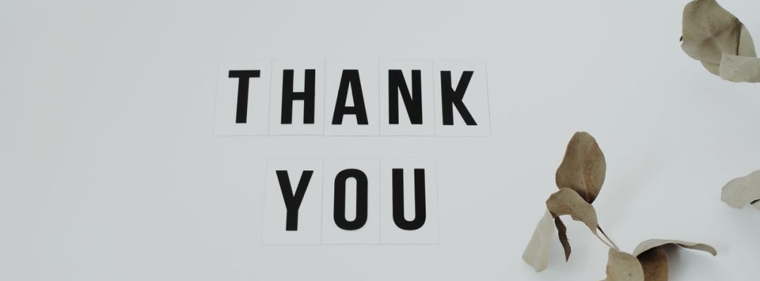 A minimalist thank you note with eucalyptus leaves, perfect for expressing gratitude.
